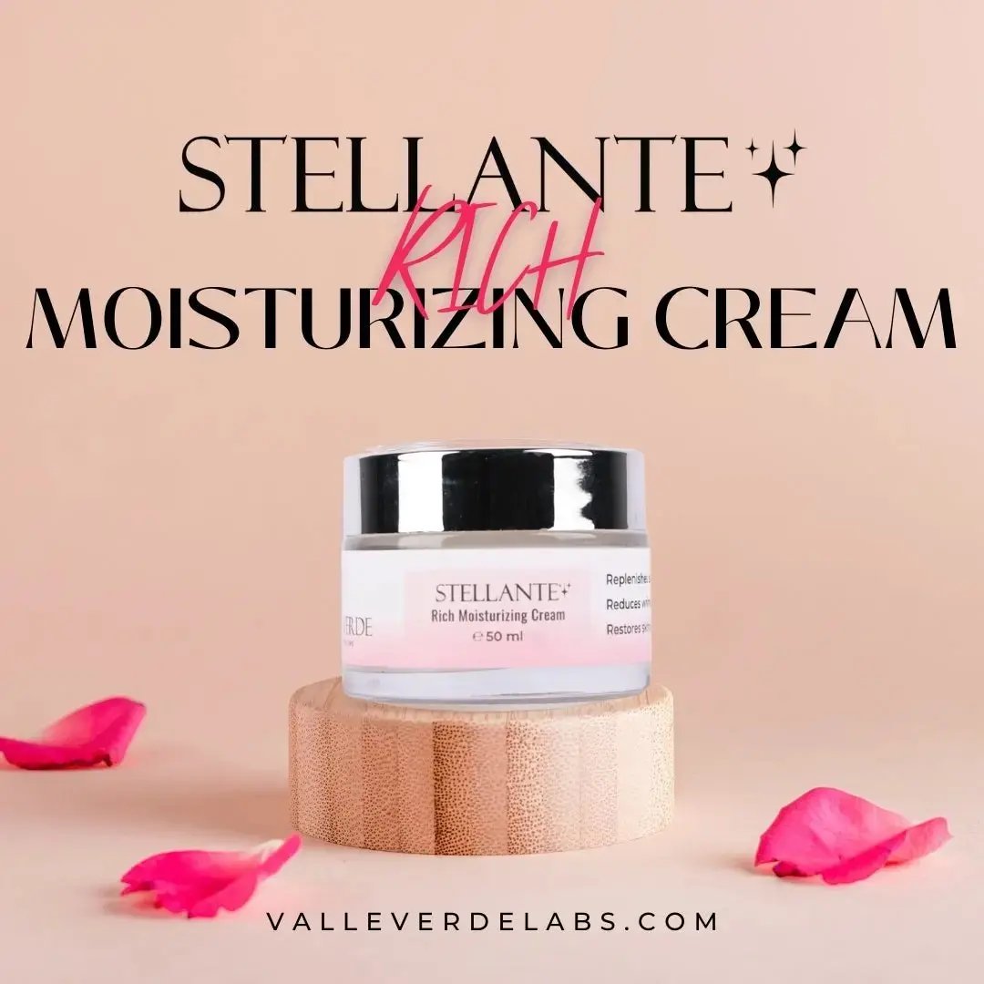 Stellante Rich Moisturizing Cream jar on a beige background with pink petals