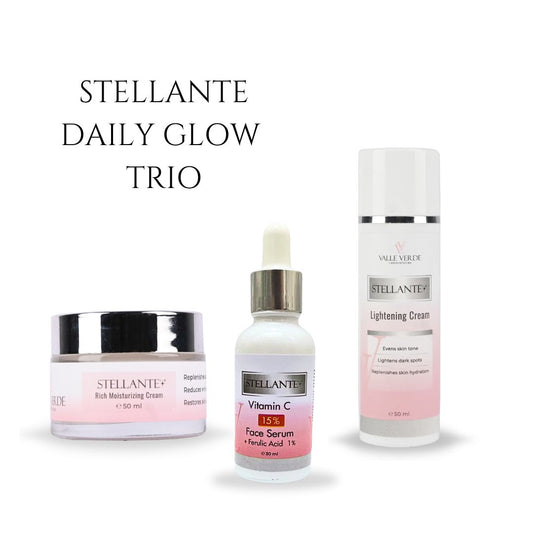 Stellante Daily Glow Trio with cream, serum, and lightening cream on a white background