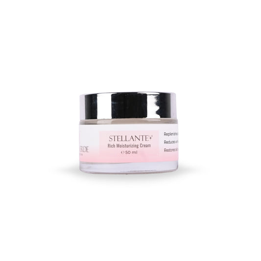 A jar of Stellante Rich Moisturizing Cream with a pink label on a white background.